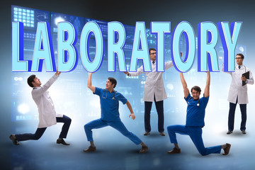 Group of doctors holding laboratory letters