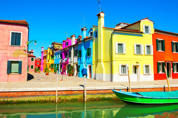 Fototapeta na wymiar Colorful houses on the canal in Burano, Venice, Italy