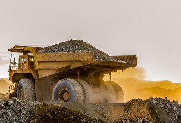 Mining dump trucks transporting Platinum ore for processing © Sunshine Seeds