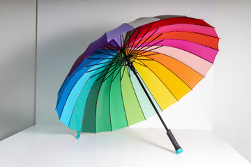 round multi-colored umbrella, rainbow color