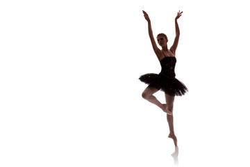woman ballerina in black pack posing on white background photo made in the style of 