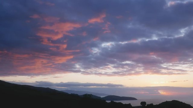 sunset on a wild island with scenic fields, Azores, Portugal