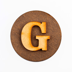 Letter G of the alphabet - wooden circle