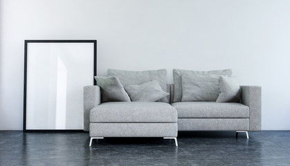 white sofa in living room with empty frame