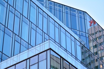 The windows of a modern building for offices. Business buildings architecture.
