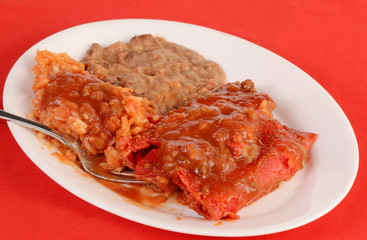 Beef Enchiladas Rojo with Rice and Refried Beans