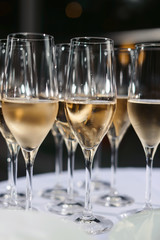 Glasses with champagne or wine at the event. Catering concept
