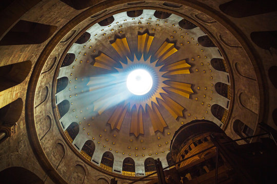 Jerusalem, Palestine, Israel-August 14, 2015: Church of the Holy Sepulchre. Light from the vault in the ceiling.
