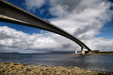 Skye Bridge to Isle of Skye over Kyle Akin Strait from Inner Sound to Loch Alsh and Eilean Ban Island with white Kyleakin lighthouse Scotland