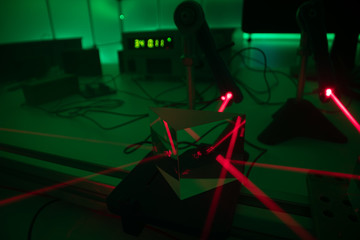 Experiment with a red laser in a physics lab