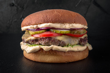 Juicy fresh delicious hamburger. The burger menu.