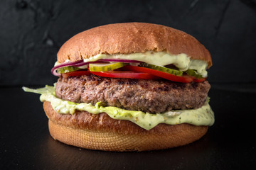 Juicy fresh delicious hamburger. The burger menu.