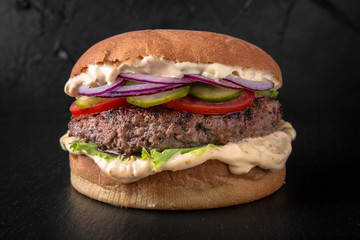 Juicy fresh delicious hamburger. The burger menu.
