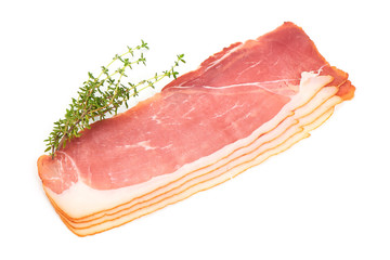 Sliced Dry Spanish ham, Jamon Serrano, Bellota, Italian Parma Prosciutto Crudo with rosemary, isolated on white background. Close-up