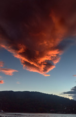 Decline or dawn over the sea.Fantastically beautiful clouds of rising or decline are reflected in waves