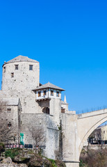 Fototapeta premium Beautiful view on Mostar city with old bridge and ancient buildings on Neretva river in Bosnia and Herzegovina