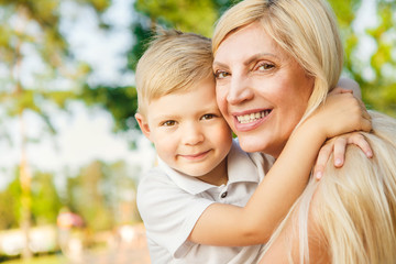 Senior woman with her grandson at the park