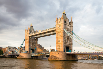 Fototapeta na wymiar Tower Bridge is a combined bascule and suspension bridge and it crosses the river Thames in London, Uk.
