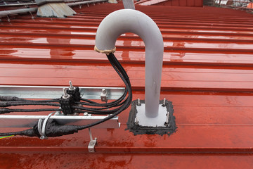 Cable tray outside with telecommunications cables, optic fiber, power cables and transmitter data...