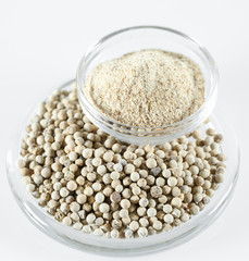 Ground White Pepper Isolated in white.