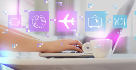 Airplane travel theme with woman using a laptop on a coffee table  © Tierney