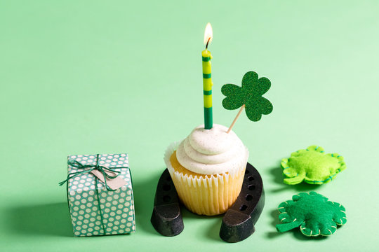 St. Patrick's Day theme with cupcake and decorations