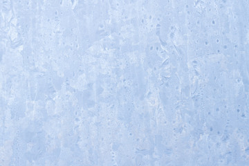 Frosty patterns on a frozen ice box in the early morning