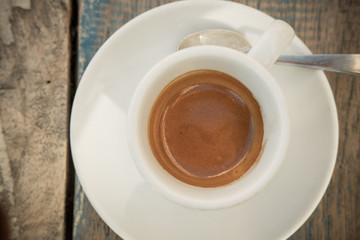 Espresso coffee in the beach in a sunny day.