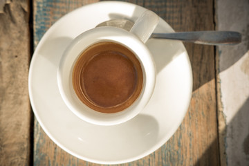 Espresso coffee in the beach in a sunny day.