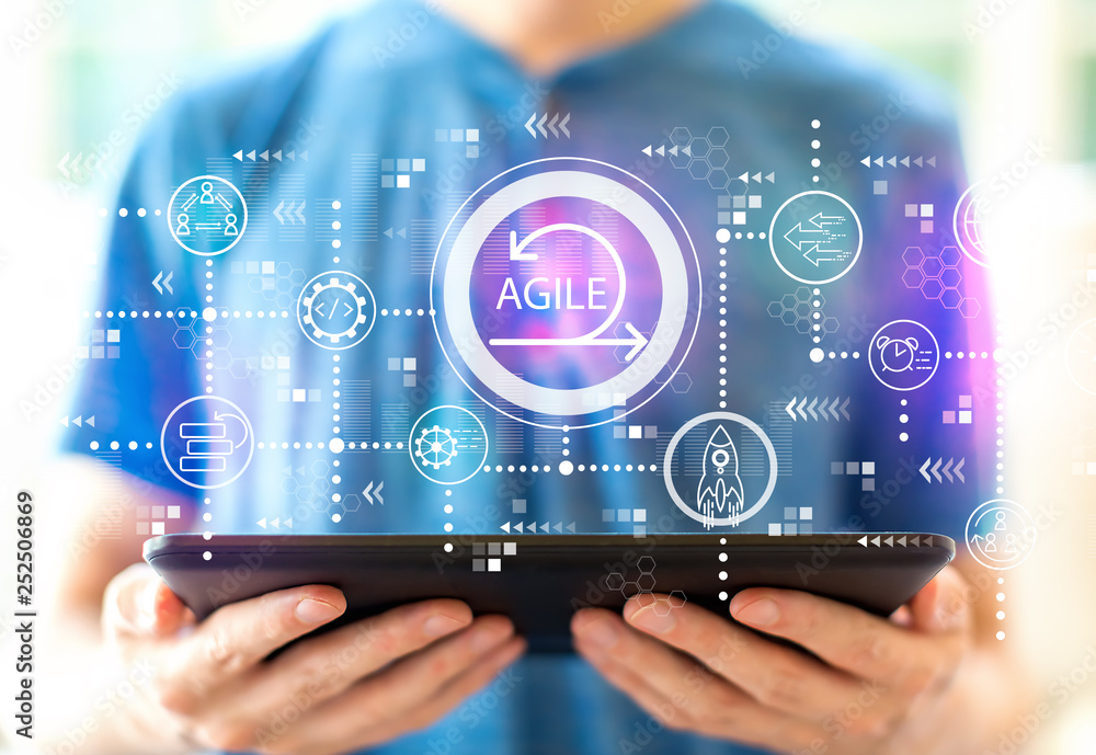 Aufkleber agile concept with young man using a tablet computer