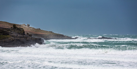 Fototapeta na wymiar Dramatic stormy sea off the coast of Cornwall, UK