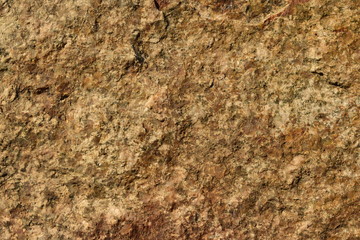 superficie rugosa de una piedra marrón