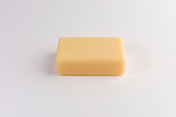 piece of beige soap isolated on a white background