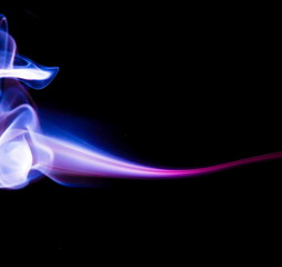 Colored smoke on black background
