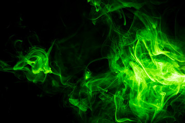 Green smoke on black background