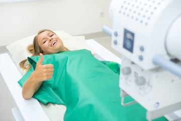 Doctor performing x-ray scanning for patient