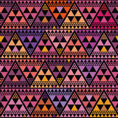 Vibrant boho style triangle repeat pattern vector design on black background. Great for luxury, wellbeing, yoga, beauty products, home decor, gift wrap, stationery, packaging.
