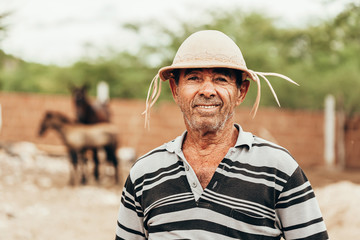 Portrait of Brazilian Northeastern cowboy wearing his typical leather hat.