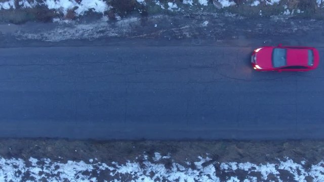 Red car driving