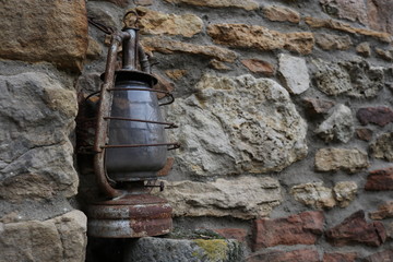 old kerosene lamp, Vintage oil lamp,The old lamp hangs,on stone background