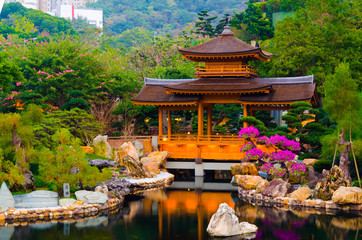 Ancient sacred temple in Asia with serene and peaceful garden water for people to pray and mediate