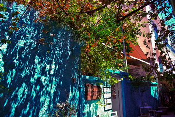 Streets city of Aegina with charming cafes, Aegina Island, Saronic Gulf, Greece