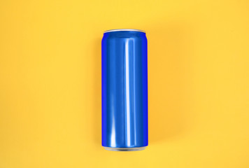 Blank metal blue can on color background, top view  Mock up for design