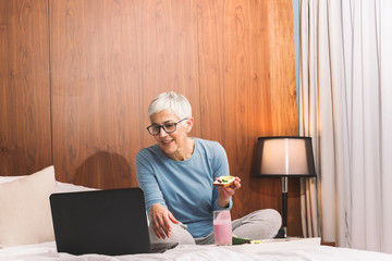 Woman looking at her laptop