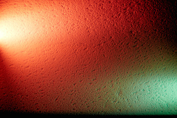 Red and green with white glows on the same background