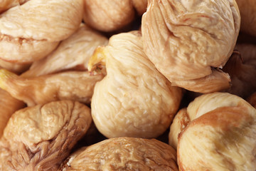 Tasty figs as background, closeup. Healthy dried fruit