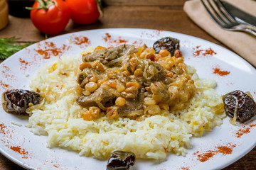 Pilaf sweet with lamb and raisins