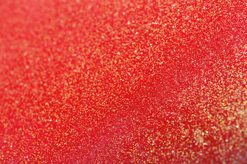 Closeup view of sparkling red glitter background