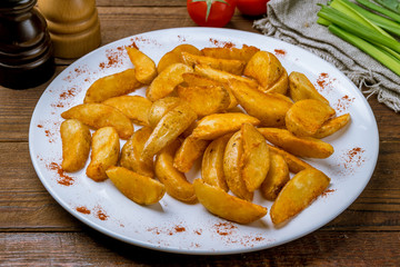 The potatoes wedges on the Board