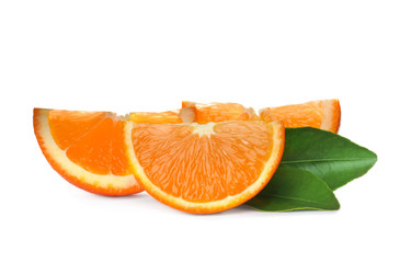 Slices of ripe orange with leaves isolated on white